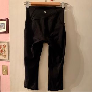 Lululemon black capris w mesh detail